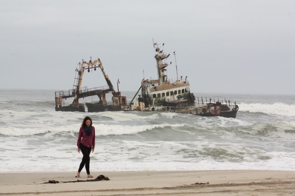 lady walking by Zeila Wreck in Dorob Skeleton Coast 