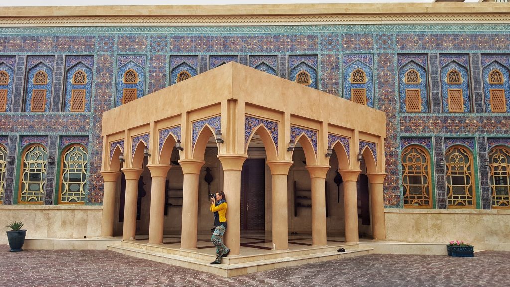 beautiful islamic building with woman taking photos at Katara