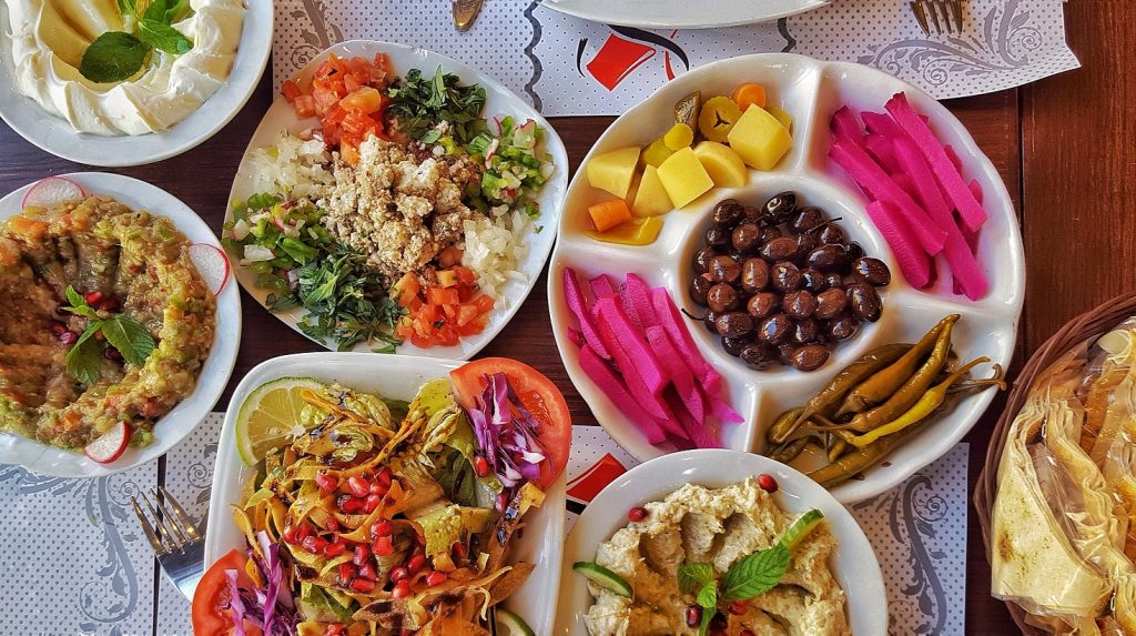 Traditional Lebanese Food with pink yellow and red colors