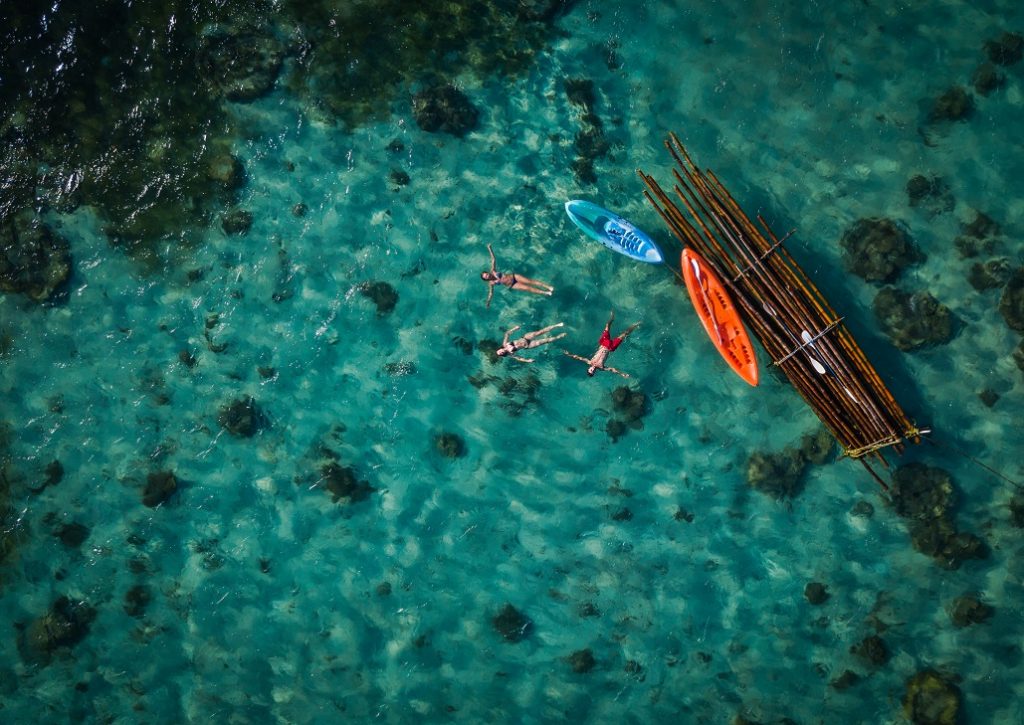 top down view of people in kayak and raft at Viti Levu in Fiji