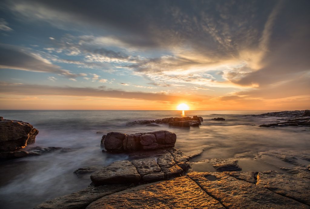 Sunrise in Australia with long exposure ocean tide