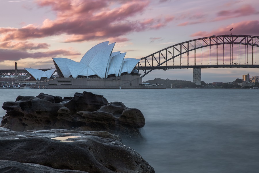 Sydney Opera House and Sydney Harbour Bridge with pink Sunset